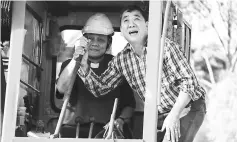  ??  ?? Dr Tie (left) officiates at the earth-breaking ceremony for the constructi­on of the new Methodist Victory Home.