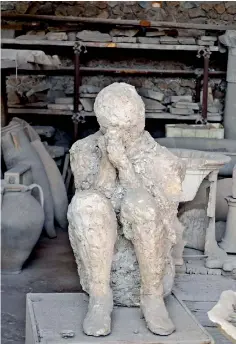  ??  ?? From nearly 2000 years ago: A petrified figure in Pompeii