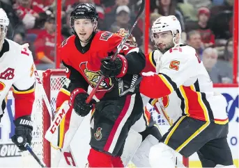  ?? JEAN L E VA C ?? Matt Duchene and the Ottawa Senators couldn’t complete a comeback against Mark Giordano and the Calgary Flames Friday night at the Canadian Tire Centre.