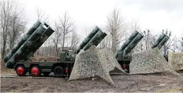  ?? — Reuters photo ?? File photo shows a new S-400 ‘Triumph’ surface-to-air missile system after its deployment at a military base outside the town of Gvardeysk near Kaliningra­d, Russia.