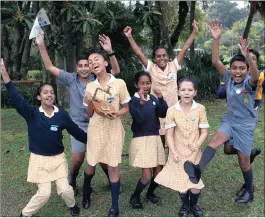  ?? PICTURE: SIBUSISO NDLOVU ?? Scottsvill­e Primary School pupils, from left, Hana Jeremiah, Kaiden Subiah, Gabrielle Hollenberg, Alicia Naidoo, Amone Stieger, Joshua Pillay, and, at the rear, Bethlehem Shimelis and Preshaine Singaram celebrate after their school was named tops in a...