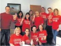  ??  ?? Staff from David W Harris & Co Solicitors taking part in 2017 Wear Red for Velindre