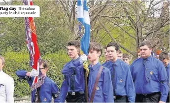  ??  ?? Flag day The colour party leads the parade