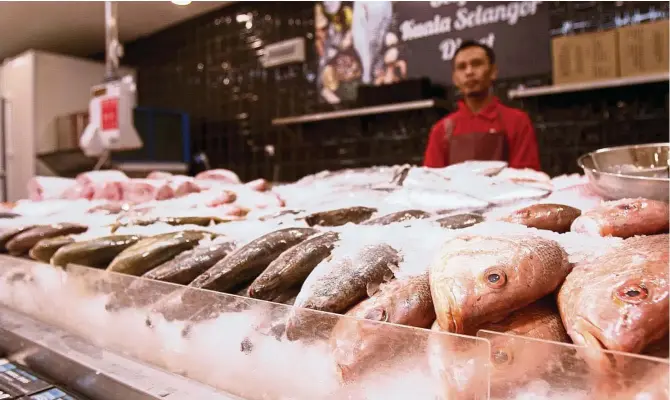  ??  ?? Teng says when the Bangsar Market by Jaya Grocer is introduced in KL Eco City, the seafood section will be expanded to include more imported produce. — Photos: YAP CHEE HONG/ The Star