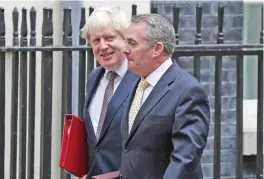  ??  ?? LONDON: British Foreign Minister Boris Johnson (left) and Internatio­nal Trade Minister Liam Fox leave the weekly cabinet meeting at 10 Downing Street in London yesterday. — AFP
