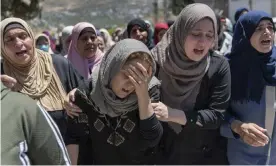  ??  ?? The funeral of Husam Asayra, 20, in the West Bank village of Asira al-Qibliya, near Nablus, on May 15. Photograph: Nasser Nasser/AP