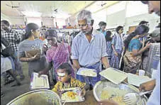  ?? AP ?? Kerala’s floodhit people at a relief camp set up inside a school in Kochi on Thursday.