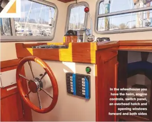  ??  ?? In the wheelhouse you have the helm, engine controls, switch panel, an overhead hatch and opening windows forward and both sides