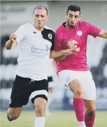  ??  ?? Joe Gormley (right) in action for Posh against Boreham Wood.