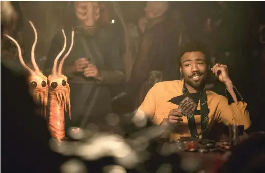  ?? LUCASFILM ?? Donald Glover is a scene- stealer as the young Lando Calrissian in “Solo: A StarWars Story.”