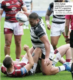  ?? RICHARD SELLERS/PA ?? Chris Satae celebrates scoring Hull FC’S opening try against Wigan