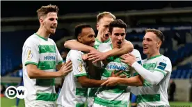  ??  ?? Greuther Fürth's players celebrate a famous win over top-flight opponents Hoffenheim