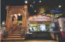  ??  ?? Casa Bonita’s menu is frozen in time, reflecting the Tex-mex favorites that were popular during its 1974 opening: burrito, enchilada and taco platters that average about $15 each.