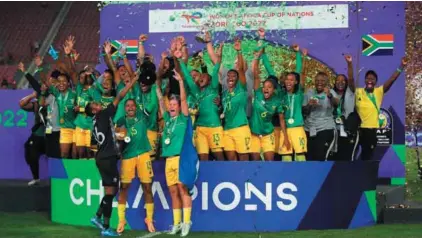  ?? ?? Continent’s champions: Banyana Banyana players celebrate after winning the Women’s Africa Cup of
Nations in Rabat, Morocco, on 23 July. They beat the host team 2-1.