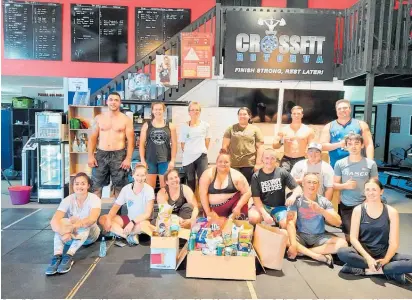  ?? Photo / Robyn Fisher ?? Crossfit Rotorua members did aworkout and collected food for the Rotorua Daily Post Christmas Appeal for the Salvation Army Foodbank.