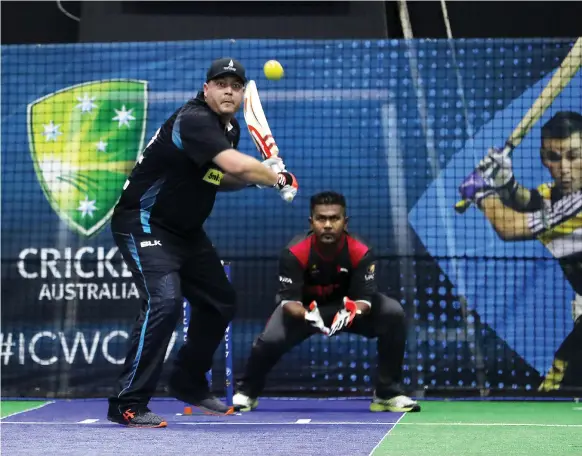  ?? Pawan Singh / The National ?? Jesse Ryder helped New Zealand to a 14-run victory over hosts UAE in their Indoor Cricket World Cup opener at Insportz Club in Dubai