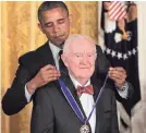  ?? ALEX WONG/GETTY IMAGES ?? Former Supreme Court Justice John Paul Stevens was presented with a Presidenti­al Medal of Freedom in 2012.