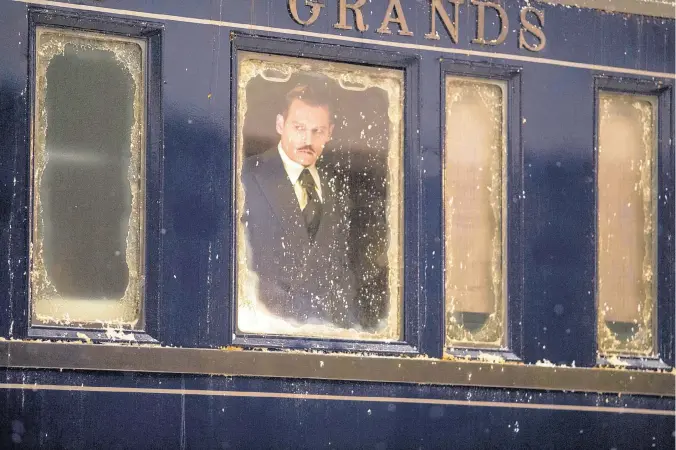  ?? COURTESY OF NICOLA DOVE/TWENTIETH CENTURY FOX ?? Johnny Depp in a scene from “Murder on the Orient Express.”