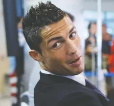  ?? — GONZALO ARROYO MORENO/GETTY IMAGES FILES ?? Cristiano Ronaldo is the man on the pitch but his agent, Jorge Mendes, is the man responsibl­e for getting his rich contracts.