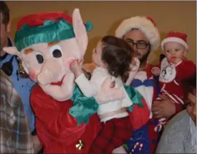  ??  ?? All sorts of Christmas characters showed up at Sunnybrook Ballroom Dec. 15 to have some fun during the annual holiday party for children.