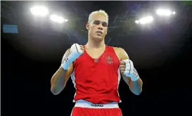  ?? PHOTOSPORT ?? Hamilton heavyweigh­t David Nyika is assured of a medal after his quarterfin­al opponent failed to appear for their bout.