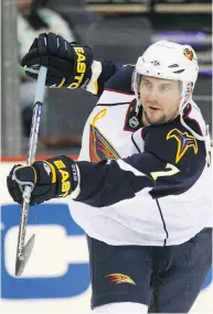  ?? BRUCE BENNETT / GETTY IMAGES ?? Nathan Oystrick warms up with the Atlanta Thrashers in March 2009, before one of the 65 NHL games he played.