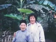  ??  ?? He Fuyu and her daughter Cheng Congrong at their home in Longchang, Sichuan province, in 2002.