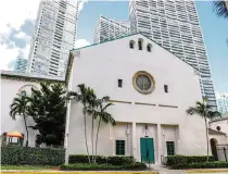  ?? ?? Members of First Miami Presbyteri­an Church will vote on Sunday about whether to sell the church’s waterfront parking lot and the Key Point Christian Academy building.