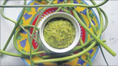  ?? ARI LEVAUX ?? Toum is a Lebanese aioli-like sauce of garlic, salt and olive oil. LOTS of garlic.