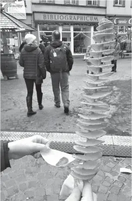  ?? Tim Schnupp/Tribune News Service/TNS ?? ■ That is a single potato, with a serious spiral cut, deep fried to perfection on Dec. 10 in Heidelberg, Germany.