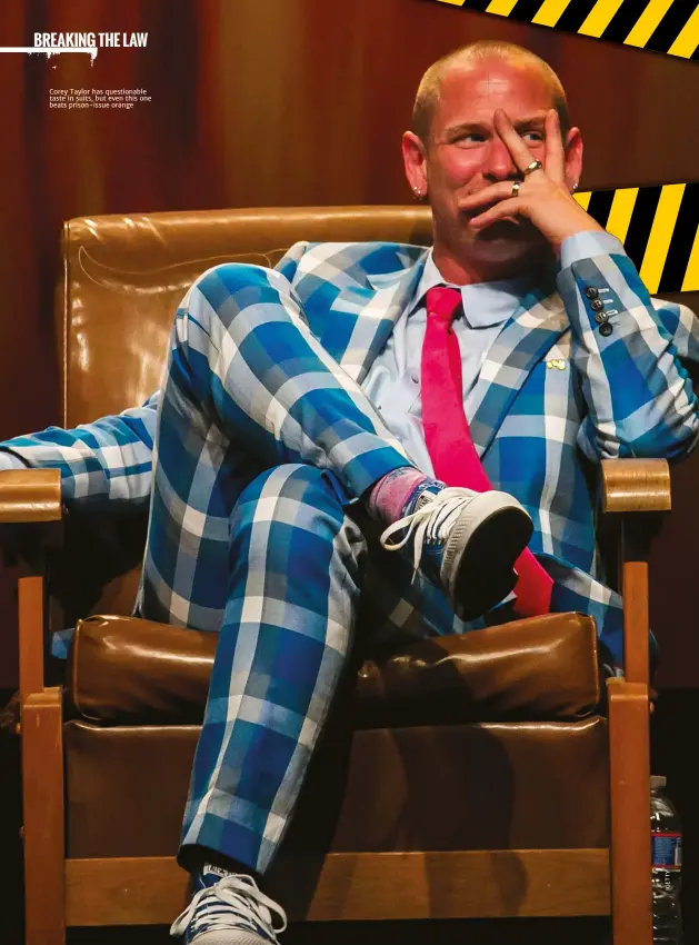  ??  ?? Corey Taylor has questionab­le taste in suits, but even this one beats prison-issue orange