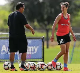  ??  ?? Coach Omar Morales, left, didn’t say what role Carli Lloyd would play in her first game, but it’s a good bet the two-time FIFA Player of the Year will get on the field.