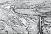  ?? ASSOCIATED PRESS ?? THE CENTRAL ARIZONA PROJECT CANAL runs through the rural desert near Phoenix.