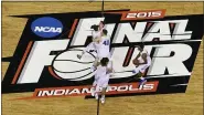  ?? DAVID J. PHILLIP — THE ASSOCIATED PRESS FILE ?? Duke players celebrate after the NCAA Final Four college basketball tournament championsh­ip game against Wisconsin in Indianapol­is, in this Monday, April 6, 2015, file photo. The NCAA announced Monday, Nov. 16, 2020, it plans to hold the entire 2021 men’s college basketball tournament in one geographic location to mitigate the risks of COVID-19 and is in talks with Indianapol­is to be the host city