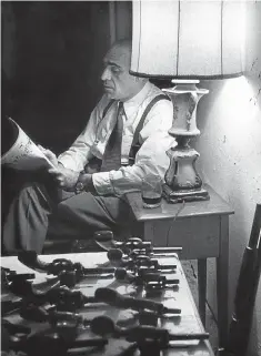  ?? Picture: AFP PHOTO ?? THE CALM BEFORE THE STORM: Abe Vigoda guards an arsenal of revolvers as Sal Tessio in ‘The Godfather’