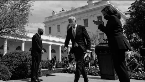  ?? AP Photo/Andrew Harnik ?? President Joe Biden, accompanie­d by Vice President Kamala Harris (right) and Attorney General Merrick Garland (left) departs after speaking about gun violence prevention in the Rose Garden at the White House, on Thursday in Washington.