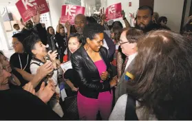  ?? Santiago Mejia / The Chronicle 2019 ?? Kimberly Ellis ( center) was selected by S. F. Mayor London Breed to head the Department on the Status of Women, which was establishe­d in 1994.