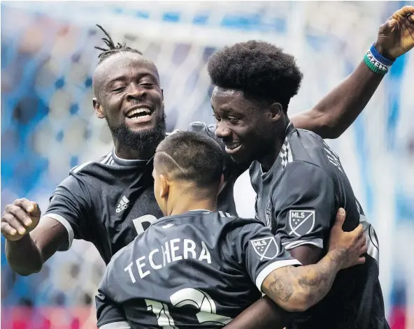  ?? — THE CANADIAN PRESS FILES ?? Vancouver Whitecaps’ Kei Kamara, back left, Cristian Techera and Alphonso Davies celebrate Davies’ goal against the Montreal Impact in the season opener March 4 at B.C. Place — the only goal the team has scored on their home field this season.