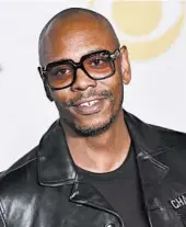  ?? CHARLES SYKES/INVISION 2018 ?? Dave Chappelle says America is enduring “the wrath of God” for police assaults on black men in his new special.