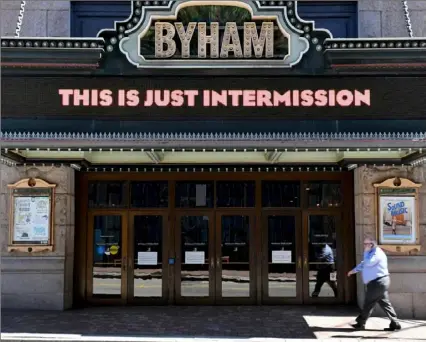  ?? Matt Freed/Post-Gazette ?? The Byham Theater’s marquee sends a message to Pittsburgh­ers on March 26 in Downtown.