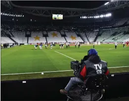  ?? MARCO ALPOZZI — THE ASSOCIATED PRESS ?? A view of the empty Juventus stadium, as a measure against coronaviru­s contagion, prior to the Serie A soccer match between Juventus and Inter, in Turin, Italy, Sunday. Serie A played on Sunday despite calls from Italy’s sports minister and players’ associatio­n president to suspend the games in Italy’s top soccer division.