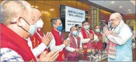  ?? PTI ?? Union home minister Amit Shah greets members from different groups of Assam in New Delhi on Saturday.