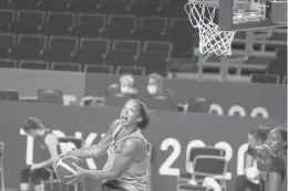  ?? CHARLIE NEIBERGALL/AP ?? France’s Gabby Williams, who also played at UConn, shoots during a practice at the Summer Olympics on July 24 in Saitama, Japan.