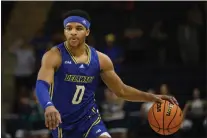  ?? NICK WASS — THE ASSOCIATED PRESS ?? Delaware guard Jameer Nelson Jr. (0) in action during the Colonial Athletic Associatio­n championsh­ip game. Nelson Jr. is the son of former Saint Joseph’s star Jameer Nelson Sr.