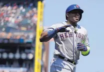  ?? BEN MARGOT/ASSOCIATED PRESS ?? New York’s Yoenis Cespedes celebrates after hitting a homer off Moriarty High alum Matt Moore of San Francisco.