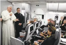  ?? Andrew Medichini / Associated Press ?? Pope Francis talks to reporters during a news conference on board his flight to Rome after his five-day visit to Colombia.