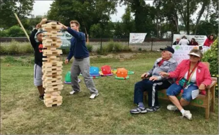  ?? PHOTO PROVIDED ?? Attendees play giant Jenga at Main Street Day 2018in Castleton-on-Hudson.