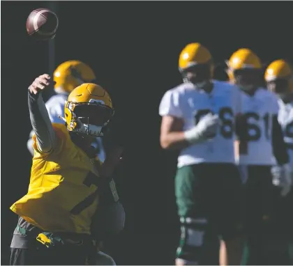  ?? DAVID BLOOM ?? Elks quarterbac­k Trevor Harris, here throwing at practice this week, hasn't had consistent protection from an offensive line that has seen many changes of personnel this season. Harris is sitting out Friday's rematch against the Bombers.