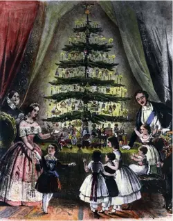  ??  ?? Royal Christmas tree in 1848 with Queen Victoria and family