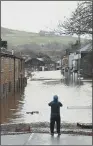  ?? PICTURE: GETTY IMAGES ?? DELUGE: Flood water covers the roads and car parks in Mytholmroy­d.